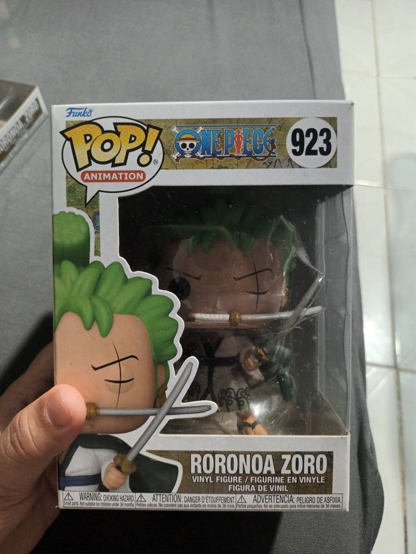 Funko Pop Animation One Piece Roronoa Zoro Figures (Category: Figurines & Statues) located in Abucay. Submitted by moonlitnook_bookshop (Listing ID 1458983208, Image 3). Description: Selling multiple Funko Pop figures of Roronoa Zoro from One Piece. Includes numbers 1775, 327, 923, and 2391. Also includes Stitch as Beast, number 1459. All figures are in their original boxes. Great collectibles for any fan..