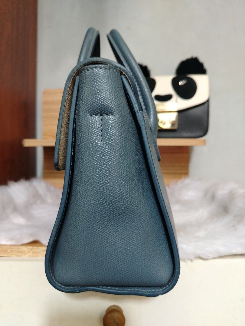 Furla Metropolis Satchel Bag (Category: Luxury Bags & Wallets) located in Lucena. Submitted by gracious_chin0436 (Listing ID 1458905619, Image 3). Description: - Signature gold turn-lock closure - Structured, elegant shape - Comfortable top handles for carrying - Versatile: perfect for daily use or special event - Interior is clean and well-maintained.