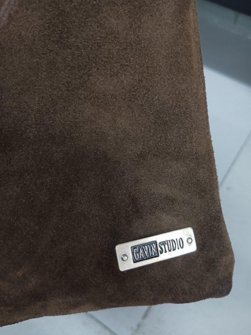 Gavin Studio Brown Suede Shoulder Bag with Buckle (Category: Shoulder Bags) located in Quezon City. Submitted by arvietekto (Listing ID 1458902650, Image 3). Description: - Brown suede shoulder bag from Gavin Studio - Classic design with a silver buckle closure on the front flap - Black strap - Black fabric interior lining - Ideal for everyday use.