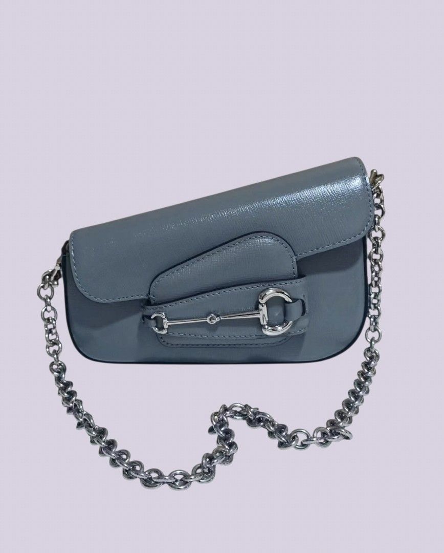 Gg H0rsębit 1955 Shoulder Bag (Category: Shoulder Bags) located in Caloocan City. Submitted by love.purse (Listing ID 1458952484, Image 3). Description: - N.G.A. - from 🇯🇵 ukay - used Grey Gucci Shoulder Bag - Includes box, dust bag, and care cards - Detachable chain strap and leather shoulder strap included - Iconic horsebit detail - Versatile for day or night use.