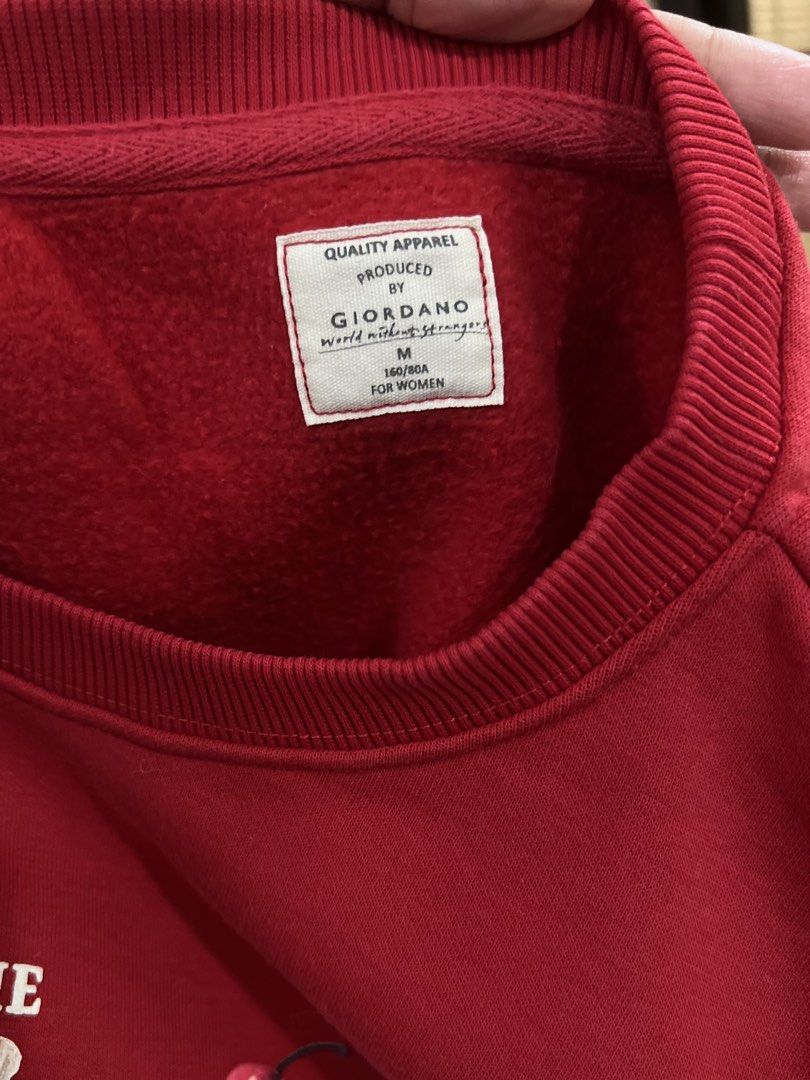 Giordano Red "The Future Is Sweet" Sweatshirt Size M (Category: Coats, Jackets and Outerwear) located in Subic. Submitted by xzikyra (Listing ID 1458905397, Image 2). Description: - Giordano Red Sweatshirt - "The Future Is Sweet" graphic on front - Ribbed cuffs and hem - Size: Medium (M) - Ideal for casual wear.