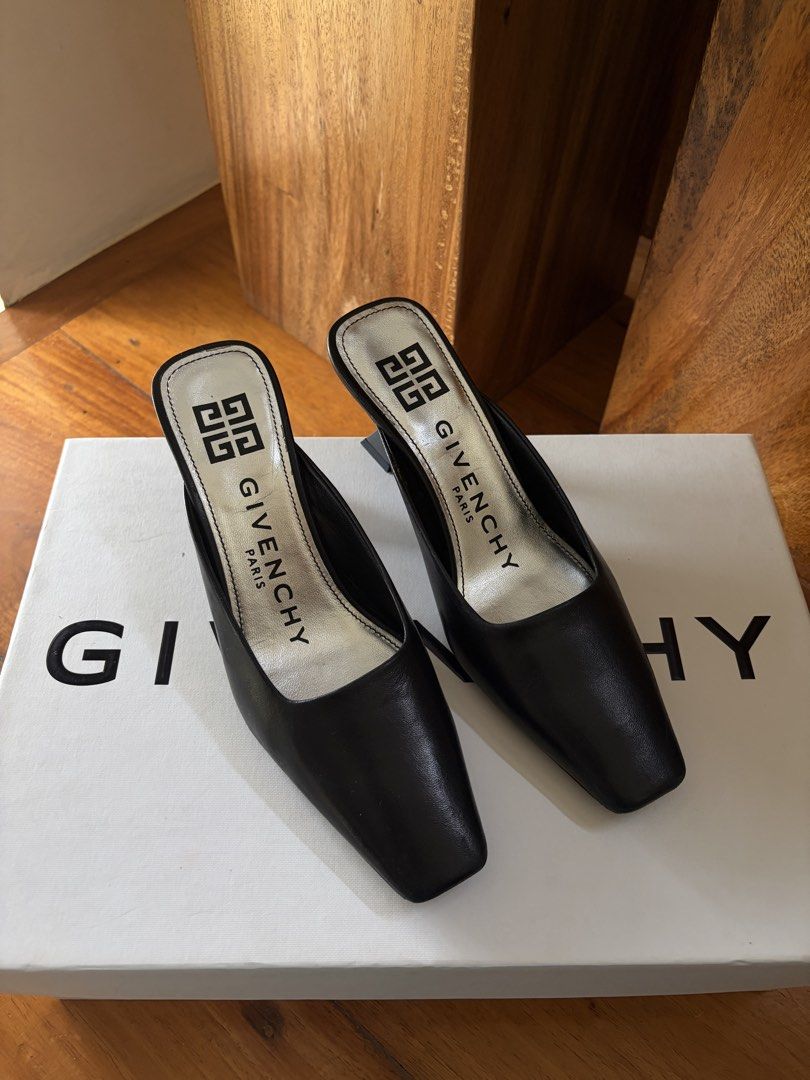Givenchy Black Leather Mules (Category: Sneakers & Footwear) located in Pasig City. Submitted by chamoisee (Listing ID 1458912318, Image 1). Description: Givenchy Black Leather Mules See pics for condition (no issues) DM FOR FASTER TRANSACTION 📩.