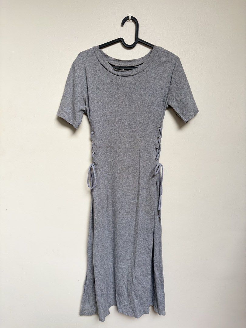 Grey Lace-Up Side Long Dress (Category: Dresses) located in Angono. Submitted by thingsbyzia (Listing ID 1459008316, Image 1). Description: - Grey midi t-shirt dress - Adjustable lace-up detailing on both sides for a custom fit - Short sleeves and crew neck - Comfortable and casual style - Slight flare at the hem.