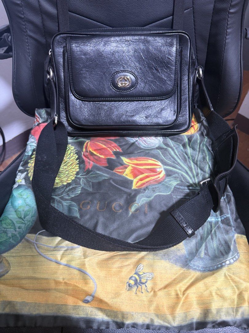 Gucci Black Leather Crossbody Bag (Category: Luxury Bags & Wallets) located in Antipolo. Submitted by declutteringirlie0317 (Listing ID 1459012728, Image 1). Description: - Authentic Gucci black leather crossbody bag - Features iconic GG logo hardware on the front flap - Secure zipper closure inside - Adjustable strap for comfortable, customized wear - Ideal for everyday use - Comes with original Gucci dust bag -Bought from Japan seller.