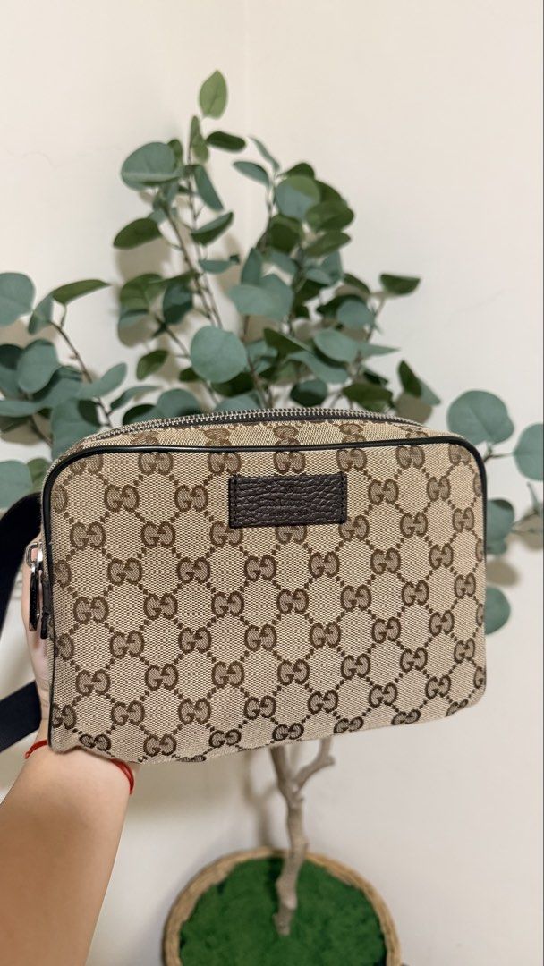 Gucci Monogram Canvas Waist Bag (Category: Luxury Bags & Wallets) located in Batangas. Submitted by etc.byflc (Listing ID 1458996976, Image 1). Description: 📍 Batangas 📌 Payment first, no COD 🛵🚚 Shipping via J&T or LBC 📩 for inquiries - Authentic Gucci waist bag - Personal preloved - Classic GG monogram canvas - Zip closure - Adjustable strap with buckle - Leather trim and details - Includes Gucci authenticity cards - Ideal for everyday use 