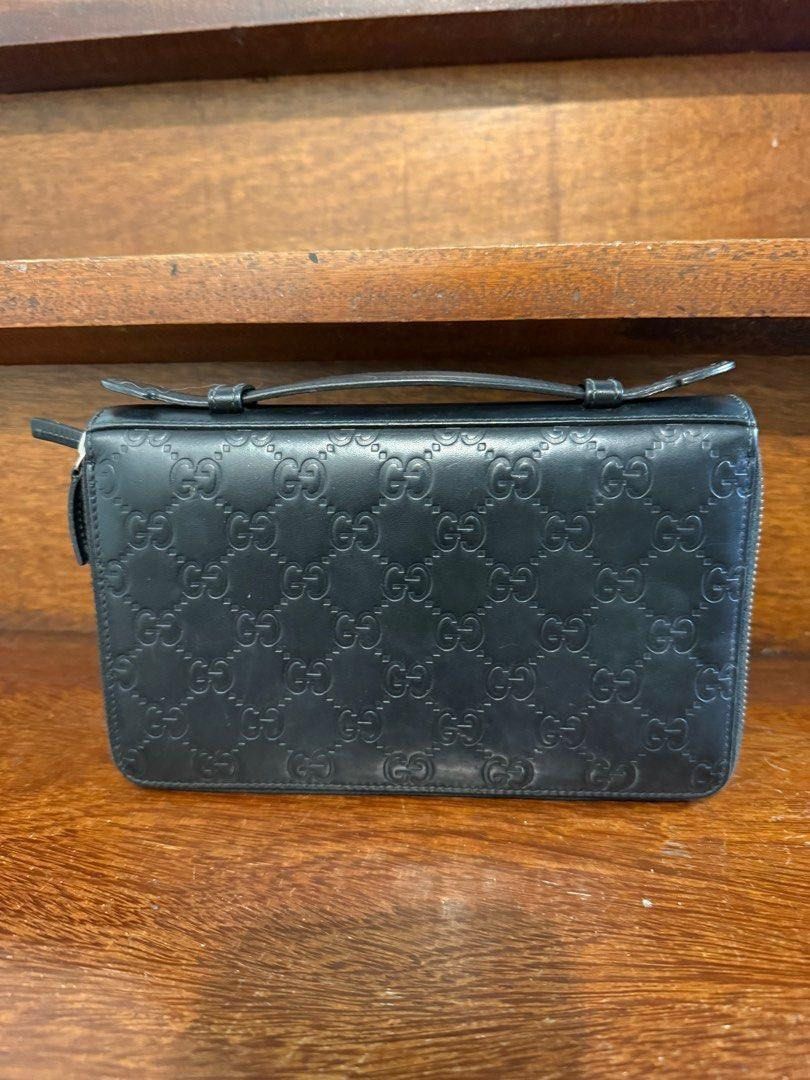GUCCI TRAVEL DOCUMENT CASE GUCCISSIMA BLACK LEATHER (Category: Luxury Bags & Wallets) located in Pasig City. Submitted by vetementsdemanila (Listing ID 1458998985, Image 3). Description: GUCCI TRAVEL DOCUMENT CASE GUCCISSIMA BLACK LEATHER Good as new 9.5/10 No dustbag/ box Guaranteed authentic P24,500 REGULAR PRICE P19,500 SALE PRICE.