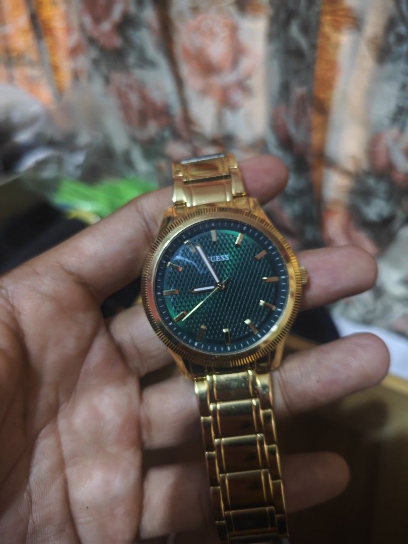 Guess Gold Watch with Green Dial (Category: Women's Watches) located in Muntinlupa City. Submitted by kidcht (Listing ID 1458894899, Image 1). Description: - Gold Guess watch - Textured green dial - Metal link strap - Classic and versatile design - Perfect for everyday wear or dressing up.