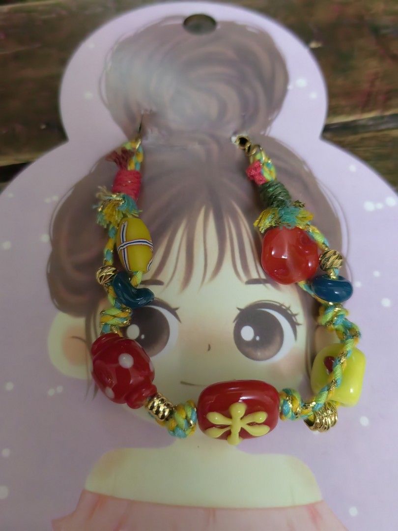 Handmade Beaded Bracelet with Charms (Category: Bracelets) located in Davao. Submitted by gelleevanelli (Listing ID 1459023787, Image 2). Description: - Cute handmade boho bracelets - Colorful beads and unique charms - Strung on braided cord - Adds a pop of color to any outfit - Great for gifting or treating yourself - Available for sale individually or as a set.