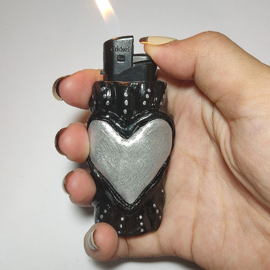 Handmade Black and Silver Heart Clay Lighter Case (Category: Handmade Craft) located in Bacoor. Submitted by kmrynl (Listing ID 1458965794, Image 3). Description: handcrafted clay lighter case by me! - lighter is included :) - accepting custom orders, dm for inquiries (price starts at 310) check out my socials to see more available items ♡ FB & IG: charmsbyk8 [tags: anik anik, clay keychain, y2k, grunge, heart, lighter case, handmade] MOP: BPI/Ma