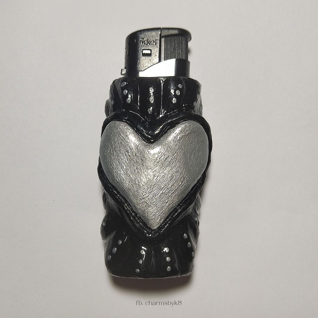 Handmade Black and Silver Heart Clay Lighter Case (Category: Handmade Craft) located in Bacoor. Submitted by kmrynl (Listing ID 1458965794, Image 1). Description: handcrafted clay lighter case by me! - lighter is included :) - accepting custom orders, dm for inquiries (price starts at 310) check out my socials to see more available items ♡ FB & IG: charmsbyk8 [tags: anik anik, clay keychain, y2k, grunge, heart, lighter case, handmade] MOP: BPI/Ma