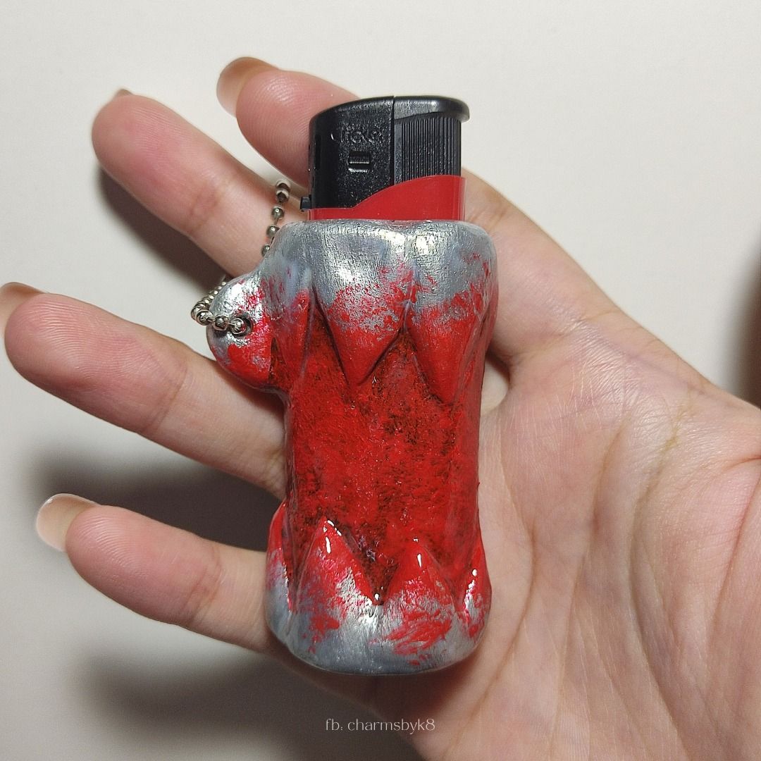 Handmade Silver Spikes/Teeth with Blood Lighter Case Keychain (Category: Vintage Collectibles) located in Bacoor. Submitted by kmrynl (Listing ID 1458966902, Image 2). Description: handcrafted clay lighter case by me! - lighter is included :) - accepting custom orders, dm for inquiries (price starts at 310) check out my socials to see more available items ♡ FB & IG: charmsbyk8 [tags: anik anik, clay keychain, y2k, grunge, star, lighter case, hand