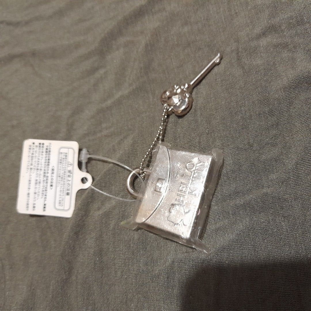 Hello Kitty Lock and Key Keychain (Category: Character Goods) located in Bocaue. Submitted by marajapansurplus (Listing ID 1458955808, Image 2). Description: - Adorable Kitty lock and key design - Silver tone metal finish - Brand new with original tags - Never used, still in packaging - Ideal for decorating bags or as a collectible item.