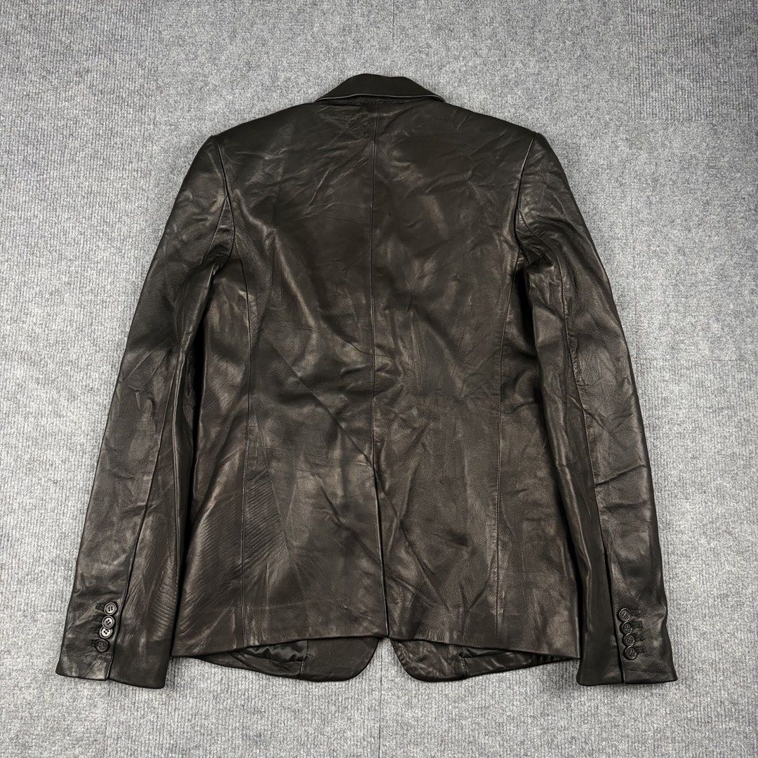 Helmut Lang Leather Blazer Onyx Black (Category: Luxury Apparel) located in Manila. Submitted by yourtherapist_ (Listing ID 1459082749, Image 3). Description: Helmut Lang Leather Blazer Onyx Black Size: 4 Condition: 9.5/10 Material: Shell 100% Lamb Leather Made in: Turkey Measurements Width: 18 Length: 27 Shoulder: 16 Sleeve: 25 True to Helmut Lang’s DNA, it avoids heavy or exposed zippers, opting for a smooth, subtle look that functions as an el