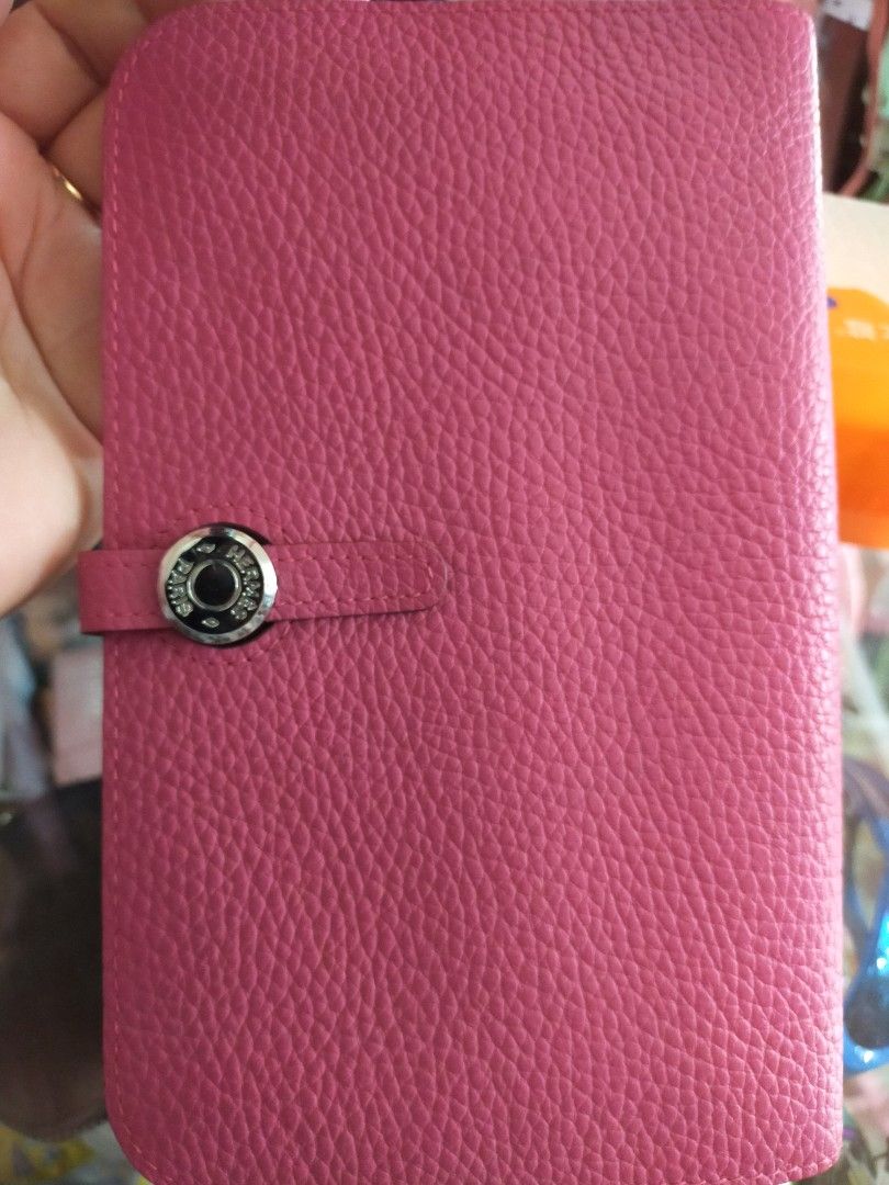 Hermes Pink Leather Wallet 💯%Original (Category: Luxury Bags & Wallets) located in Manila. Submitted by new-opening (Listing ID 1458907316, Image 3). Description: - Authentic Hermes pink leather wallet - Made in France - Snap closure - Interior card slots - Includes separate zippered pouch - Classic design, ideal for everyday use riri,M4 at the back of zipper. .