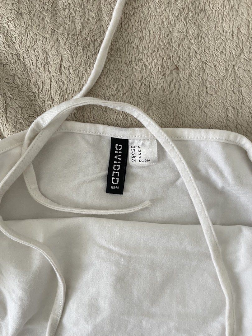 H&M white halter top (Category: Others Tops) located in Manila. Submitted by jasstazh (Listing ID 1458950513, Image 2). Description: 🛵 Lalamove only 💸 GCash payment 📦 SF shouldered by buyer.