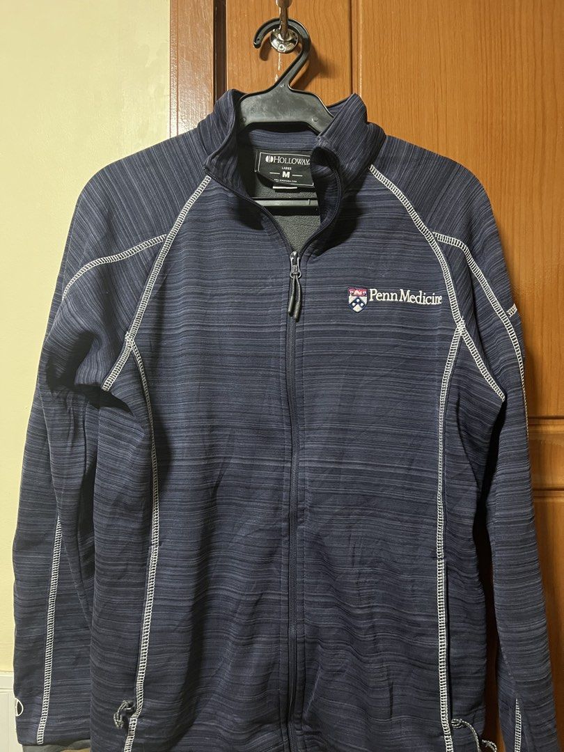 Holloway Penn Medicine Zip-Up Jacket (Category: Coats, Jackets and Outerwear) located in Baguio. Submitted by kquizon1037 (Listing ID 1459008822, Image 1). Description: - Navy blue Holloway jacket - Penn Medicine logo - Full zip-up front - Stand-up collar - White contrast stitching throughout - Size: Medium - Ideal for cooler weather or showing school spirit.