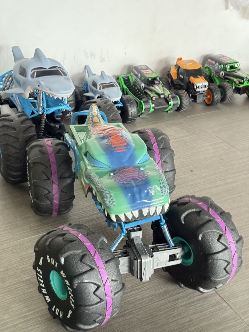 Hot Wheels/Monster Jam Monster Trucks (Category: Vehicle & Diecast Models) located in Taguig. Submitted by decluttermeph (Listing ID 1458976875, Image 2). Description: Remote Control Monster Trucks: JCB Digatron ₱2500 Megalodon ₱2500 Grave Digger Trax ₱4000 Rhinomite ₱2000 Without Remote Control: 1:6 Scale Mega Wrex and Megalodon ₱2500 each Grave Digger ₱1500 Megalodon ₱1500 Monster Jam Super Charge ₱3000.