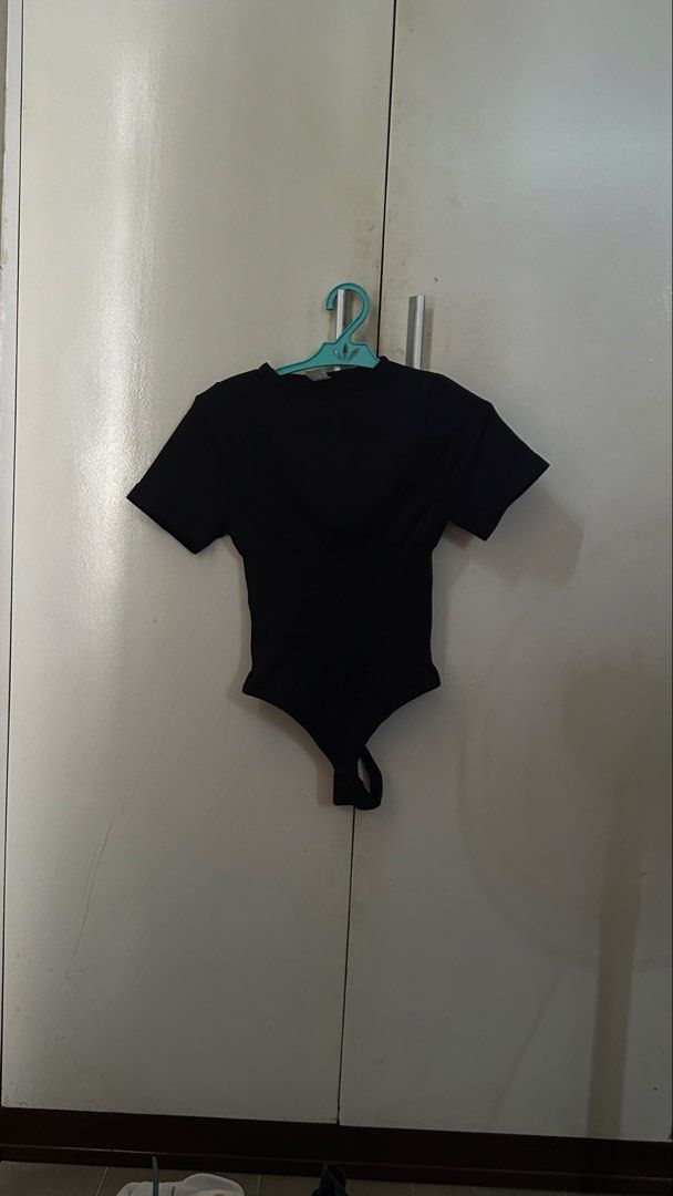 Hottie Diary Short Sleeve Bodysuit - Black & White (Category: Others Tops) located in Quezon City. Submitted by mqnochi (Listing ID 1458934437, Image 2). Description: - Set of 2 basic short-sleeve bodysuits - Colors: Black and White - Stretchy and comfortable material - Convenient snap closure at the bottom - Ideal for layering or wearing on its own - Versatile addition to any wardrobe - Great value when you buy both! - SIZE: XXS-XS.