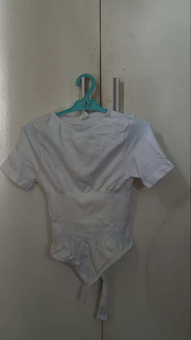 Hottie Diary Short Sleeve Bodysuit - Black & White (Category: Others Tops) located in Quezon City. Submitted by mqnochi (Listing ID 1458934437, Image 3). Description: - Set of 2 basic short-sleeve bodysuits - Colors: Black and White - Stretchy and comfortable material - Convenient snap closure at the bottom - Ideal for layering or wearing on its own - Versatile addition to any wardrobe - Great value when you buy both! - SIZE: XXS-XS.