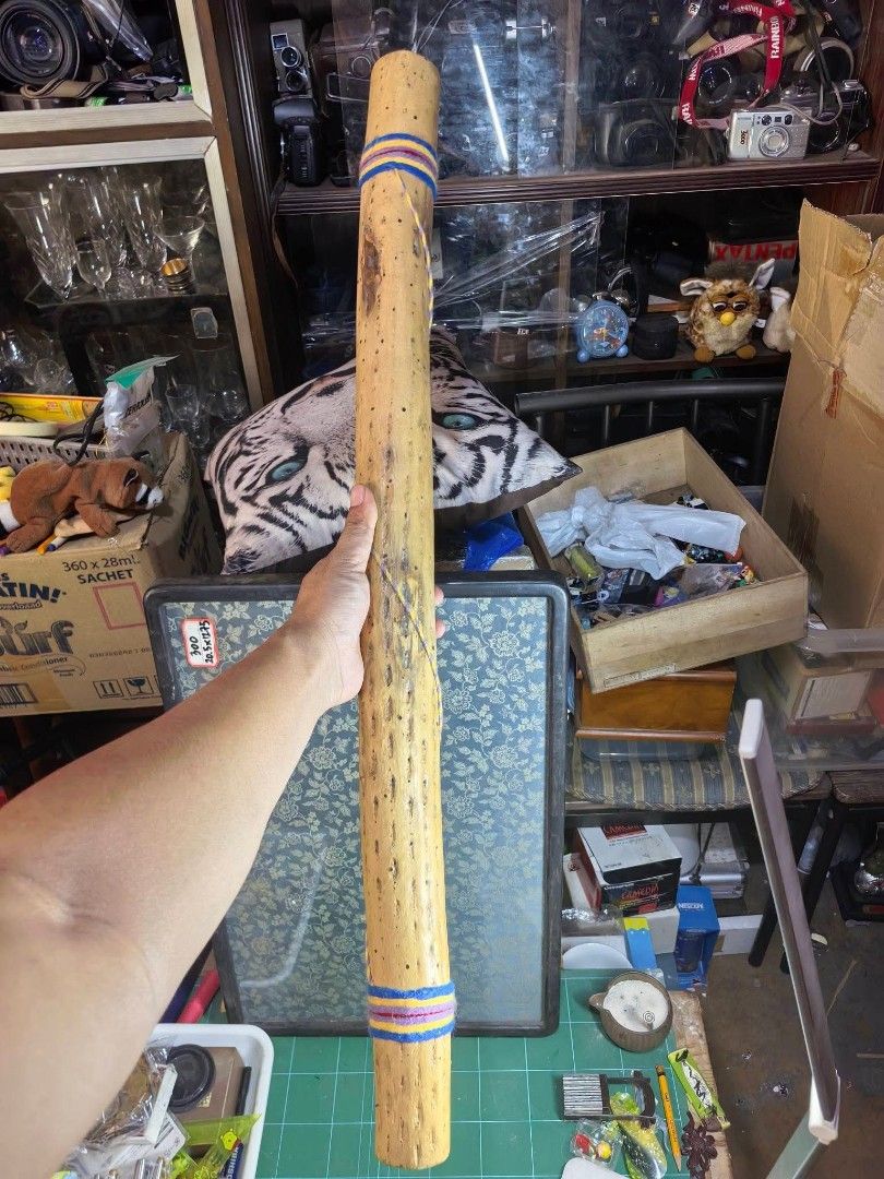 Instrument - Rainstick (Category: Musical Instruments) located in Cebu City. Submitted by dudes_villanueva (Listing ID 1458917803, Image 2). Description: Instrument - Rainstick 📌 A traditional percussion instrument designed to mimic the sound of falling rain. 📌 Material: It seems to be crafted from a dried columnar cactus skeleton, showing a hollow tubular body with natural perforation marks and decorative yarn wrapped around the top and bottom