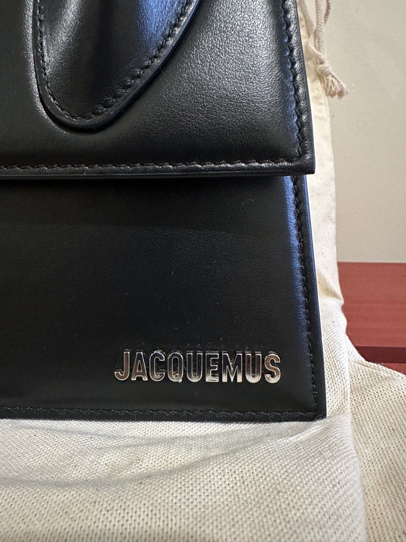 Jacquemus Le Grand Chiquito (Category: Luxury Bags & Wallets) located in Manila. Submitted by seancatubig (Listing ID 1458982206, Image 2). Description: - Authentic Black Jacquemus Bag - Used once - Genuine Leather Material - Iconic Top Handle Design - Compact Size, Big Statement - Includes Dust Bag and original unused strap - Ideal for Evenings or Elevating Outfits - Price is still negotiable .