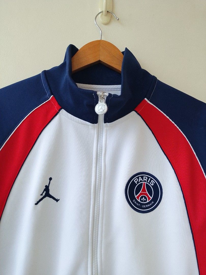 Jordan x Paris Saint Germain Anthem Track Jacket (Category: Coats, Jackets and Outerwear) located in Taytay. Submitted by elegant.revival (Listing ID 1458997058, Image 2). Description: Like new condition No issue Dimes 27L x 22.5w XXL on tag but fit XL Condition 9.5/10 Color rate 9.5/10 Shipping Nationwide ‼️.