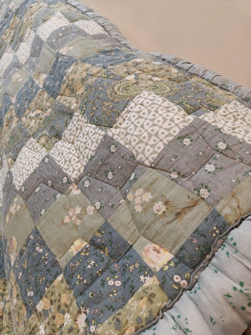 Karpet Patchwork King (Category: Bedding & Towels) located in Cyberjaya. Submitted by mixrarethrift (Listing ID 1458989583, Image 3). Description: - Beautiful patchwork quilt carpet - Features floral and paisley patterns - Colors: blue, green, and grey - Perfect for sofa throw or bedspread - Adds a cozy and decorative touch - Measures approximately [insert dimensions here if known].