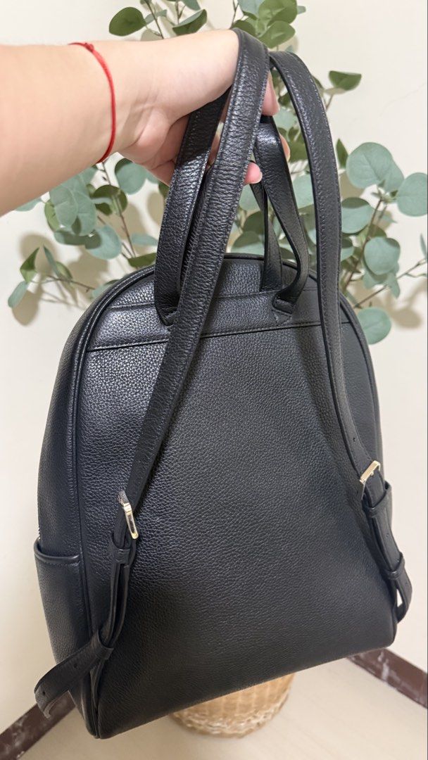 Kate Spade New York Black Leather Backpack (Category: Backpacks) located in Batangas. Submitted by etc.byflc (Listing ID 1458979078, Image 3). Description: 📍 Batangas 📌 Payment first, no COD 🛵🚚 Shipping via J&T or LBC 📩 for inquiries -Authentic, personal preloved - Classic black pebbled leather backpack from Kate Spade New York. - Elegant gold-tone hardware. - Multiple zip pockets for secure storage and organization. - Branded interior linin