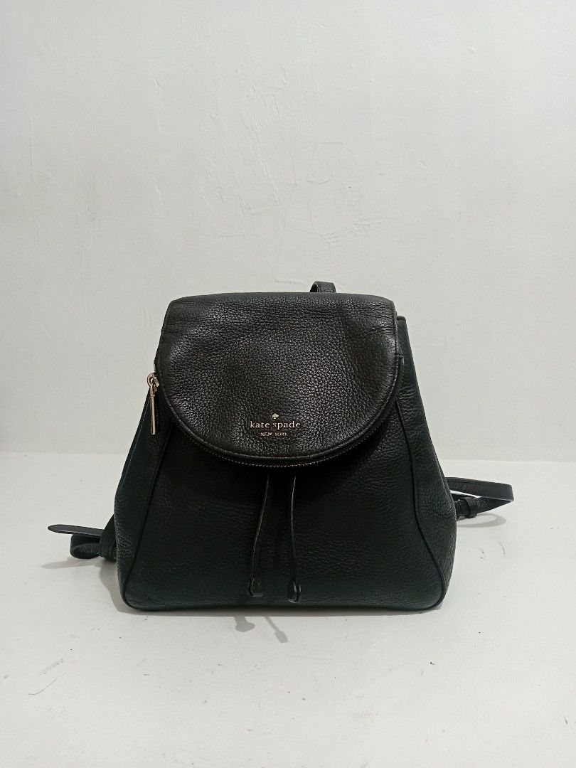 Kate Spade New York Leather Medium Backpack (Category: Luxury Bags & Wallets) located in Manila. Submitted by eriiicaspage (Listing ID 1458907238, Image 2). Description: PreOwned Lightly Used Authentic Kate Spade New York black leather Medium backpack - Material: Black pebbled leather - Closure: Drawstring with flap top - Features: Front zip pocket, adjustable straps - Ideal for: Everyday use or travel Min Sign of Used Sold the bag As is . No Any