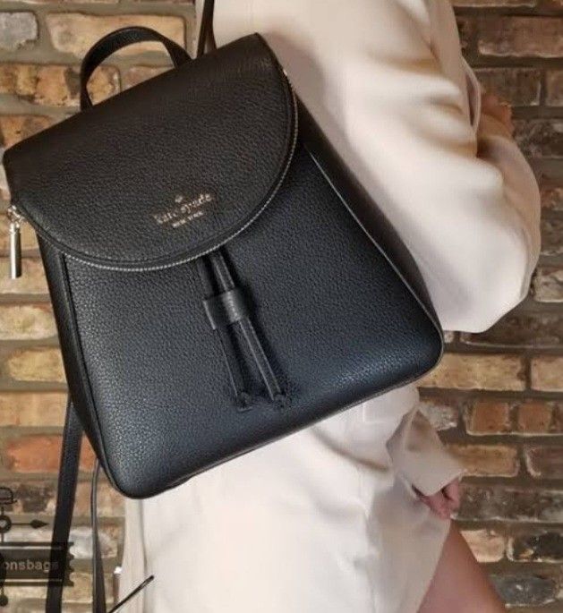 Kate Spade New York Leather Medium Backpack (Category: Luxury Bags & Wallets) located in Manila. Submitted by eriiicaspage (Listing ID 1458907238, Image 3). Description: PreOwned Lightly Used Authentic Kate Spade New York black leather Medium backpack - Material: Black pebbled leather - Closure: Drawstring with flap top - Features: Front zip pocket, adjustable straps - Ideal for: Everyday use or travel Min Sign of Used Sold the bag As is . No Any