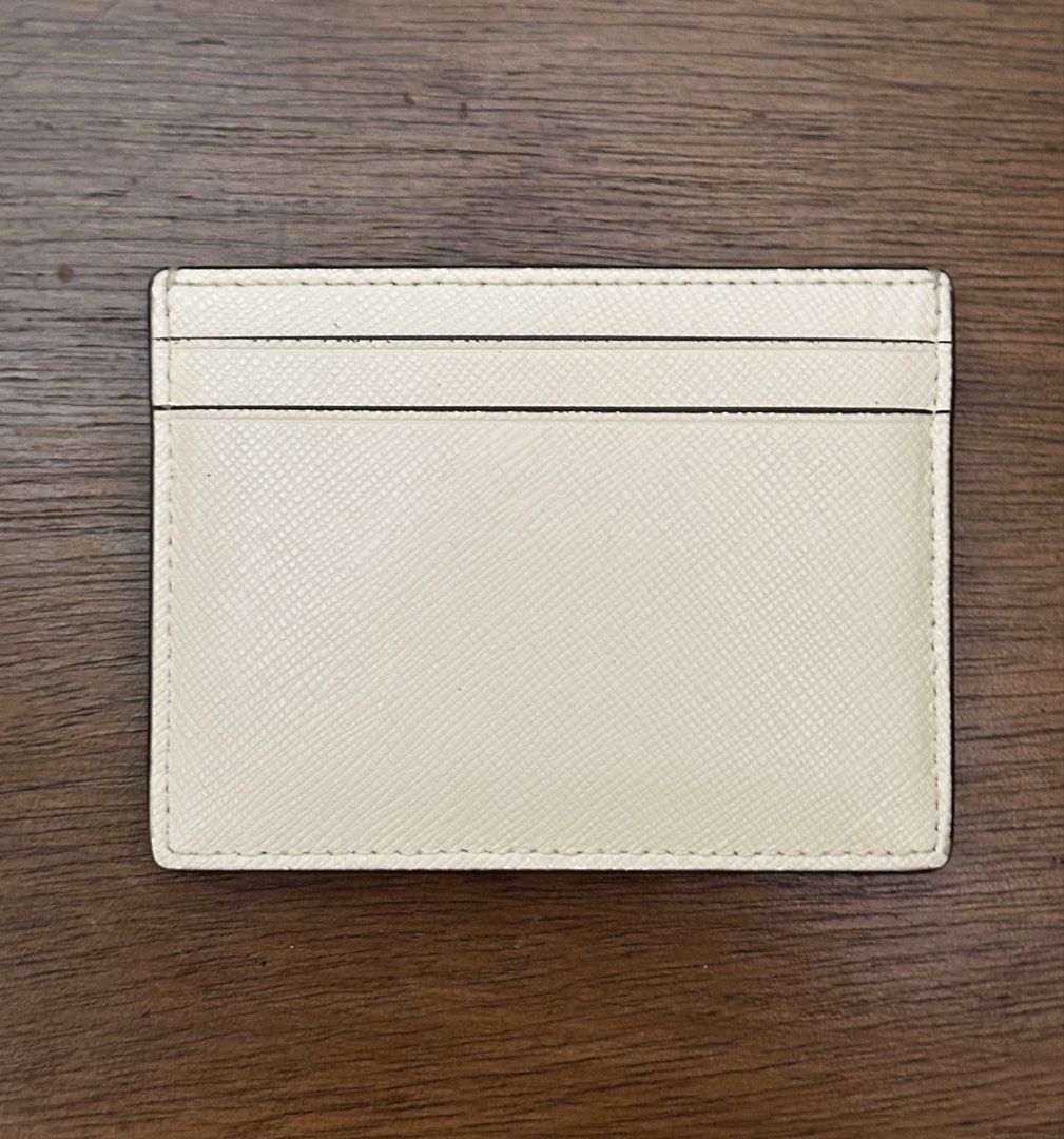 Kate Spade Slim Card Holder Wallet (White) (Category: Wallets & Card holders) located in Manila. Submitted by rystuffs (Listing ID 1458929354, Image 2). Description: - ORIGINAL, bought in Taiwan - Good condition - Bought for 4,500 - RFS: declutter .