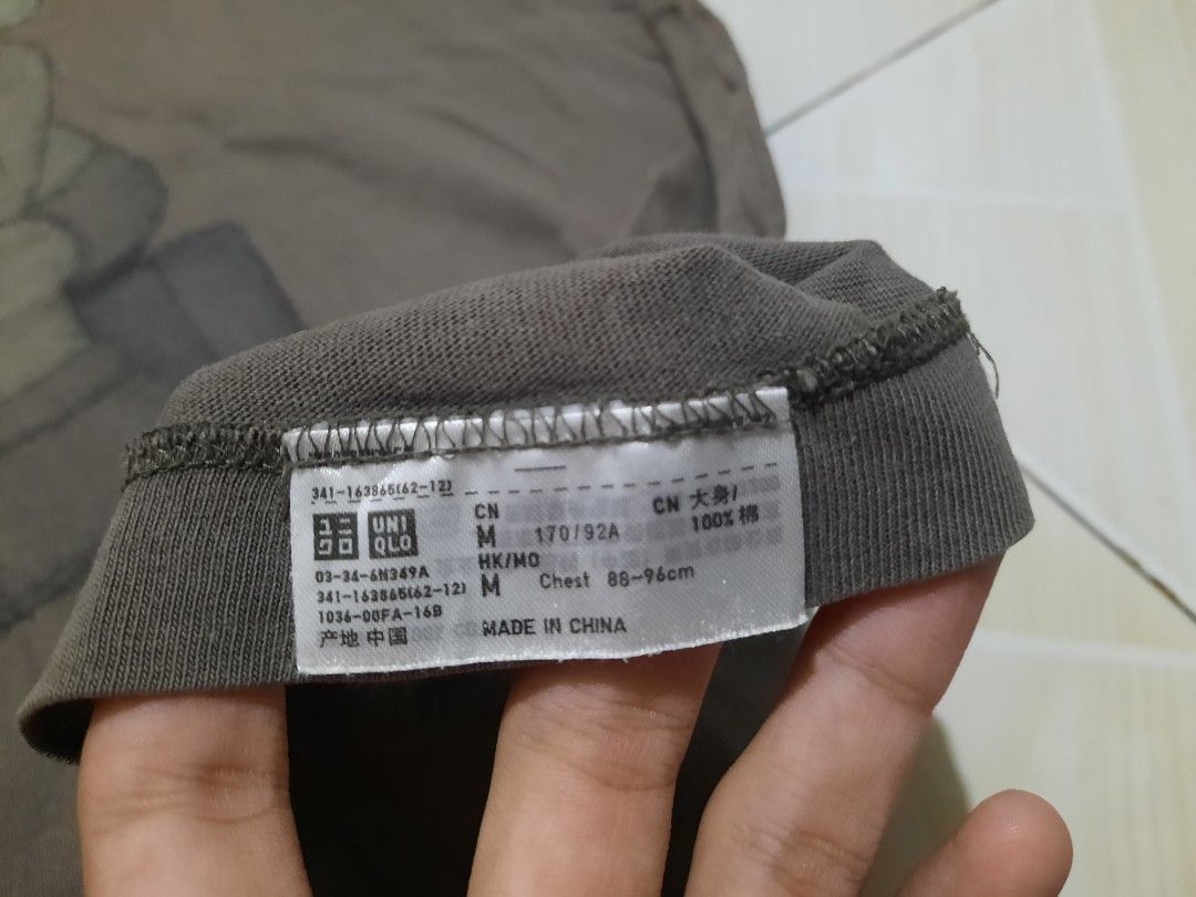 kaws uniqlo tee (Category: Tshirts & Polo Shirts ) located in Tarlac. Submitted by thryftstash (Listing ID 1459027797, Image 3). Description: dimes:27x19.5 issue:minimal fades +sf tarlac loc.