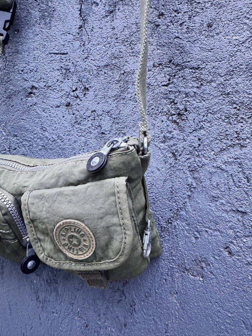 Kipling Olive Green Crossbody Bag (Category: Luxury Bags & Wallets) located in Manila. Submitted by thevintage90_sretro. (Listing ID 1459003124, Image 3). Description: Kipling Olive Green Crossbody Bag one size legit dm.
