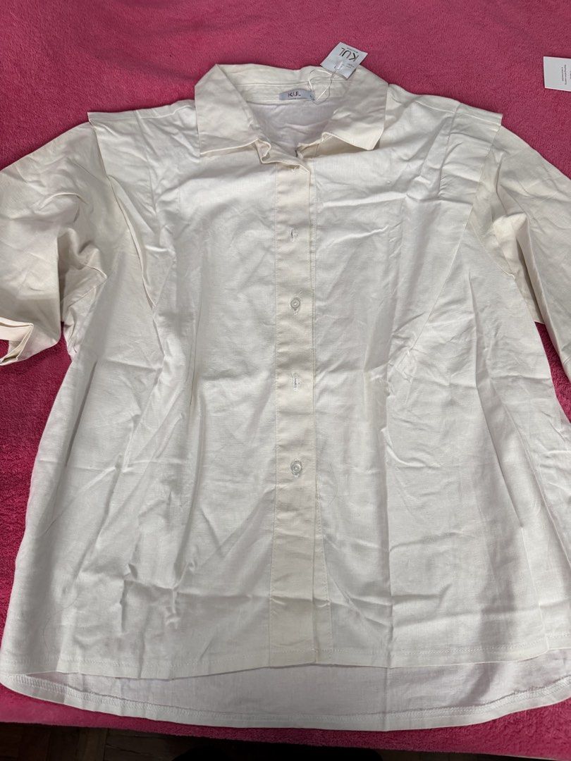 KUL Cindy Top White Button-Up Shirt Size L (Category: Blouses) located in Bacolod City. Submitted by curatrix (Listing ID 1458916701, Image 3). Description: - Brand: KUL - Style: Cindy Top - Color: White - Features: Classic collar, short sleeves, relaxed fit - Occasion: Casual, smart-casual - Condition: Brand new with original tags attached.