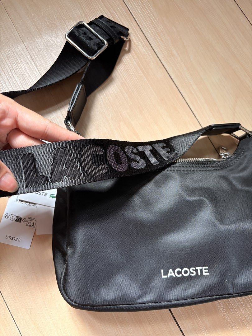 Lacoste Nylon Sling Bag (Category: Shoulder Bags) located in Makati City. Submitted by iu__00 (Listing ID 1458951526, Image 2). Description: Lacoste Black Nylon Sling Bag Authentic 💯 Bought from US 🇺🇸 Pasabuy Like new condition, no issues rfs: too small for me .