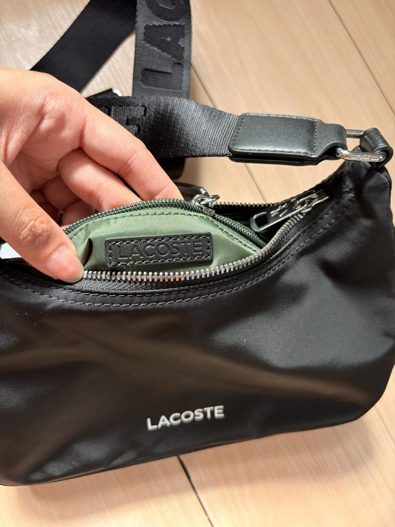 Lacoste Nylon Sling Bag (Category: Shoulder Bags) located in Makati City. Submitted by iu__00 (Listing ID 1458951526, Image 3). Description: Lacoste Black Nylon Sling Bag Authentic 💯 Bought from US 🇺🇸 Pasabuy Like new condition, no issues rfs: too small for me .