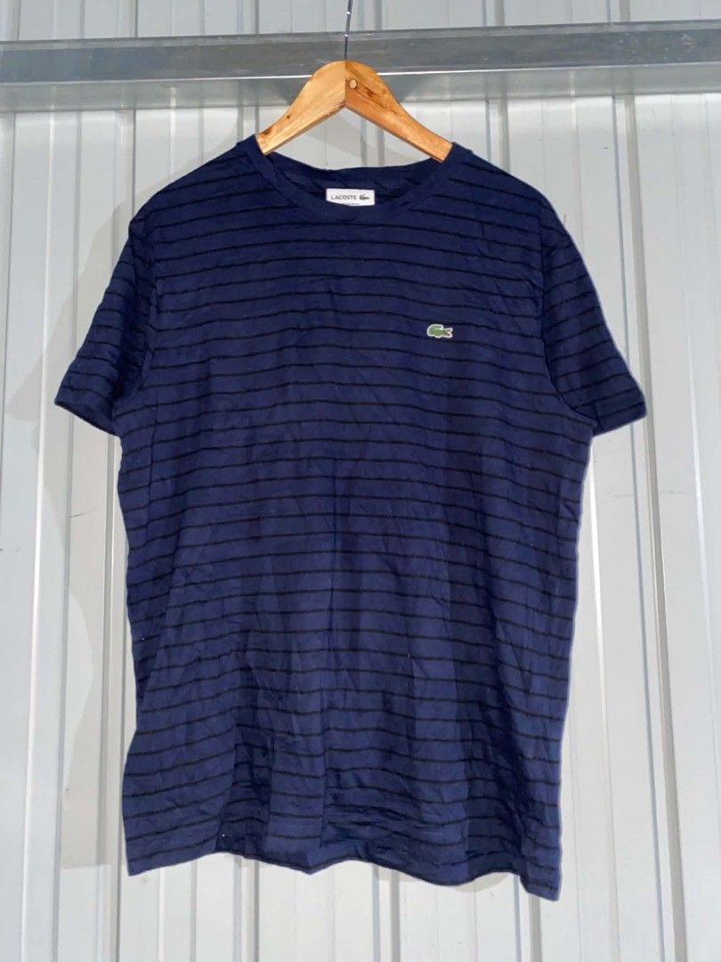 Lacoste Regular Fit Striped T-Shirt (Category: Tshirts & Polo Shirts ) located in General Santos City (Dadiangas). Submitted by winter09503 (Listing ID 1459007243, Image 1). Description: - Navy blue Lacoste t-shirt - Features thin black stripes - Classic crocodile logo on chest - Regular fit - Size: FR 5 / XXL - Ideal for casual wear.