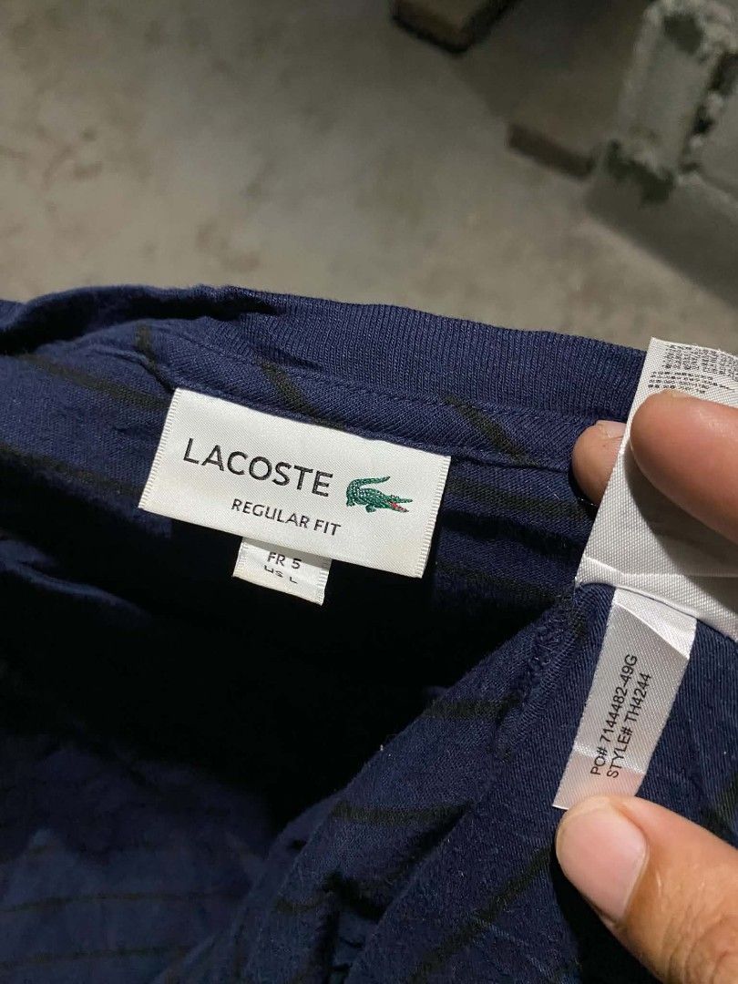 Lacoste Regular Fit Striped T-Shirt (Category: Tshirts & Polo Shirts ) located in General Santos City (Dadiangas). Submitted by winter09503 (Listing ID 1459007243, Image 2). Description: - Navy blue Lacoste t-shirt - Features thin black stripes - Classic crocodile logo on chest - Regular fit - Size: FR 5 / XXL - Ideal for casual wear.