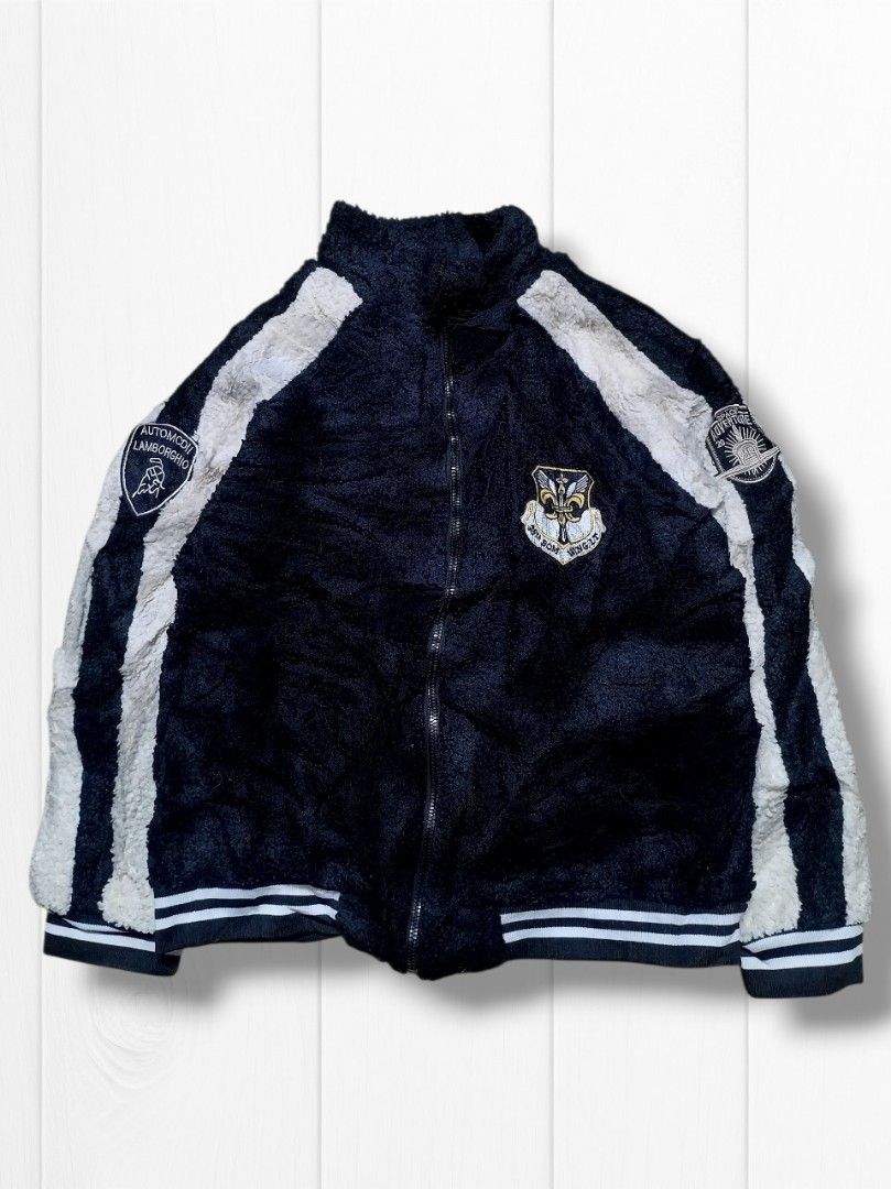 Lamborghini Air Force Bomber Fleece Jacket (Category: Coats, Jackets and Outerwear) located in Aguinaldo. Submitted by baguioukayukay2600 (Listing ID 1458890024, Image 1). Description: - Black and white fuzzy bomber jacket - Features Lamborghini and Air Force patches on sleeves and chest - Ribbed cuffs and hem for a snug fit - Zip-up front closure - Ideal for casual everyday wear.