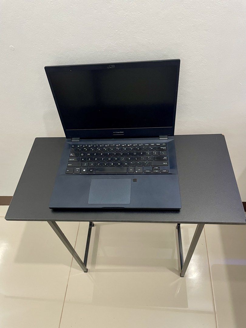 Laptop Table (Category: Office Furniture & Fixtures) located in Manila. Submitted by vinabells (Listing ID 1458923522, Image 2). Description: - Sleek black metal desk - Ideal for laptops and small workspaces - Simple assembly and portability - Perfect space-saving solution .