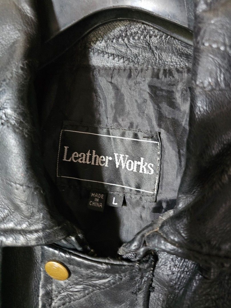 Leather Works Black Patchwork Leather Jacket Size L (Category: Coats, Jackets and Outerwear) located in Tagbilaran City. Submitted by lugarpogi (Listing ID 1458931034, Image 3). Description: - Brand: Leather Works - Style: Black leather jacket with patchwork design - Closure: Zip-up front with button closure - Features: Elasticated cuffs and hem - Material: Genuine leather shell, 100% polyester lining - Origin: Made in China - Care: Dry cleaning 