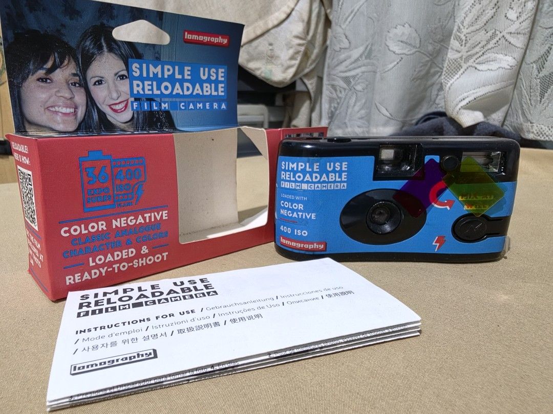 Lomography Simple Use Reloadable Film Camera (Category: Cameras) located in San Mateo. Submitted by swoooopie (Listing ID 1459030093, Image 1). Description: Lomography Simple Use Reloadable Film Camera - Classic analogue character and colors - Reloadable for endless shooting fun - Comes with original box, instructions, and drawstring pouch - Perfect for spontaneous moments and vintage-style photos - See taken pictures for sample Inclusions: - Bat