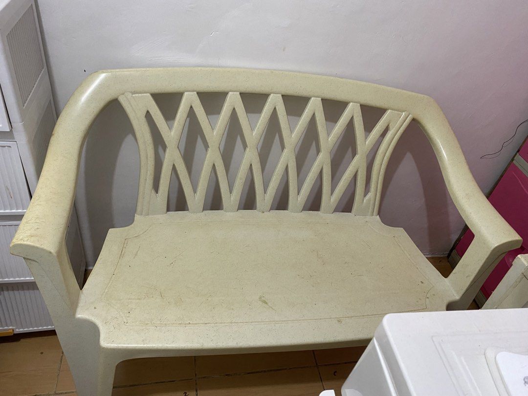 Long Cream Plastic Garden Bench Seat (Category: Chairs) located in Mandaluyong City. Submitted by hltabunda (Listing ID 1458914309, Image 1). Description: - Decluttering long monobloc chair, not enough space in the room - Will clean for sure buyer - Cream colored plastic bench - Suitable for indoor or outdoor use - Features a stylish diamond pattern on the backrest - Sturdy and durable construction - Minor scuffs from storage, doesn't affect func