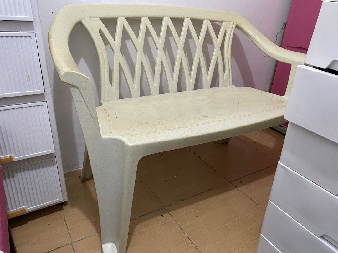 Long Cream Plastic Garden Bench Seat (Category: Chairs) located in Mandaluyong City. Submitted by hltabunda (Listing ID 1458914309, Image 2). Description: - Decluttering long monobloc chair, not enough space in the room - Will clean for sure buyer - Cream colored plastic bench - Suitable for indoor or outdoor use - Features a stylish diamond pattern on the backrest - Sturdy and durable construction - Minor scuffs from storage, doesn't affect func