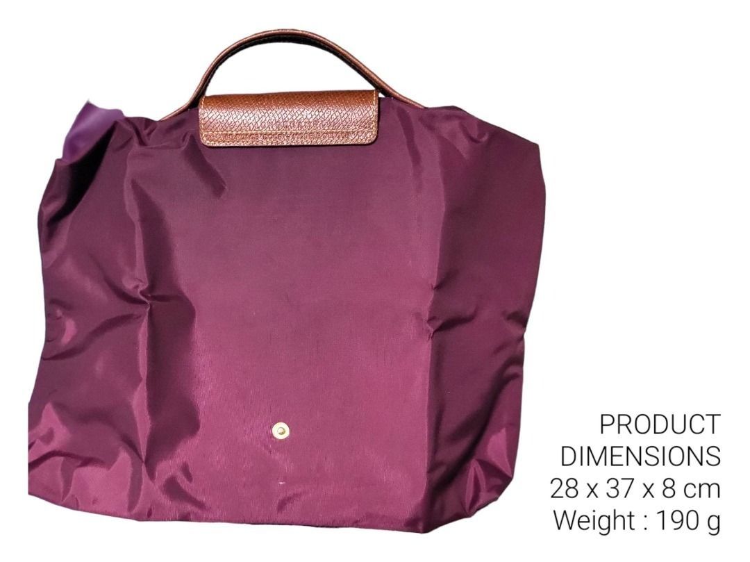 Longchamp Le Pliage Original Briefcase - Eggplant (Category: Luxury Bags & Wallets) located in Taytay. Submitted by Saturday_Mornings (Listing ID 1458934180, Image 1). Description: - Authentic Longchamp Le Pliage Original Briefcase - Color: Eggplant - Dimensions: 28 x 37 x 8 cm - Lightweight: 190g - Secure zipper closure - Features leather handles and flap detail - Ideal for everyday use or travel Material : Polyamide canvas with inside coating M