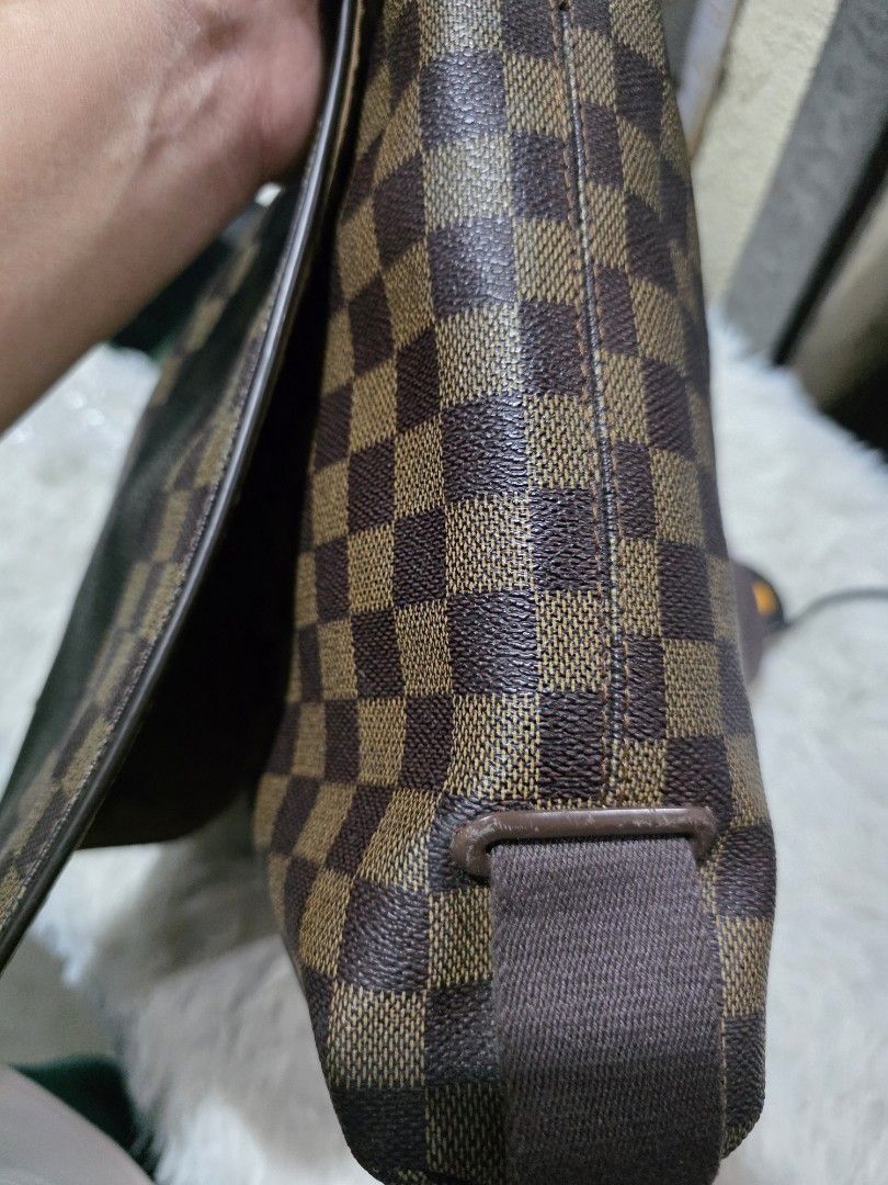 Louis Vuitton Damier Ebene Canvas Messenger Bag (Category: Luxury Bags & Wallets) located in Lemery. Submitted by venus23 (Listing ID 1459030343, Image 3). Description: - Louis Vuitton messenger bag - Classic Damier Ebene canvas - Spacious interior for daily essentials - Secure zipper closure - Adjustable strap for comfortable wear - Timeless piece for everyday use - Please check photos for condition details.