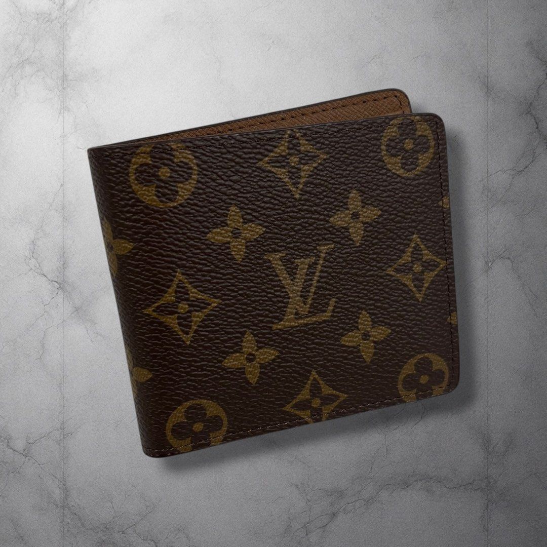 Louis Vuitton Monogram Bifold Wallet (Category: Luxury Bags & Wallets) located in Cavite. Submitted by itsayaaa (Listing ID 1459047918, Image 1). Description: - Classic Louis Vuitton bifold wallet - Iconic monogram canvas - Multiple card slots - Bill compartment - Ideal for everyday use - A timeless accessory.