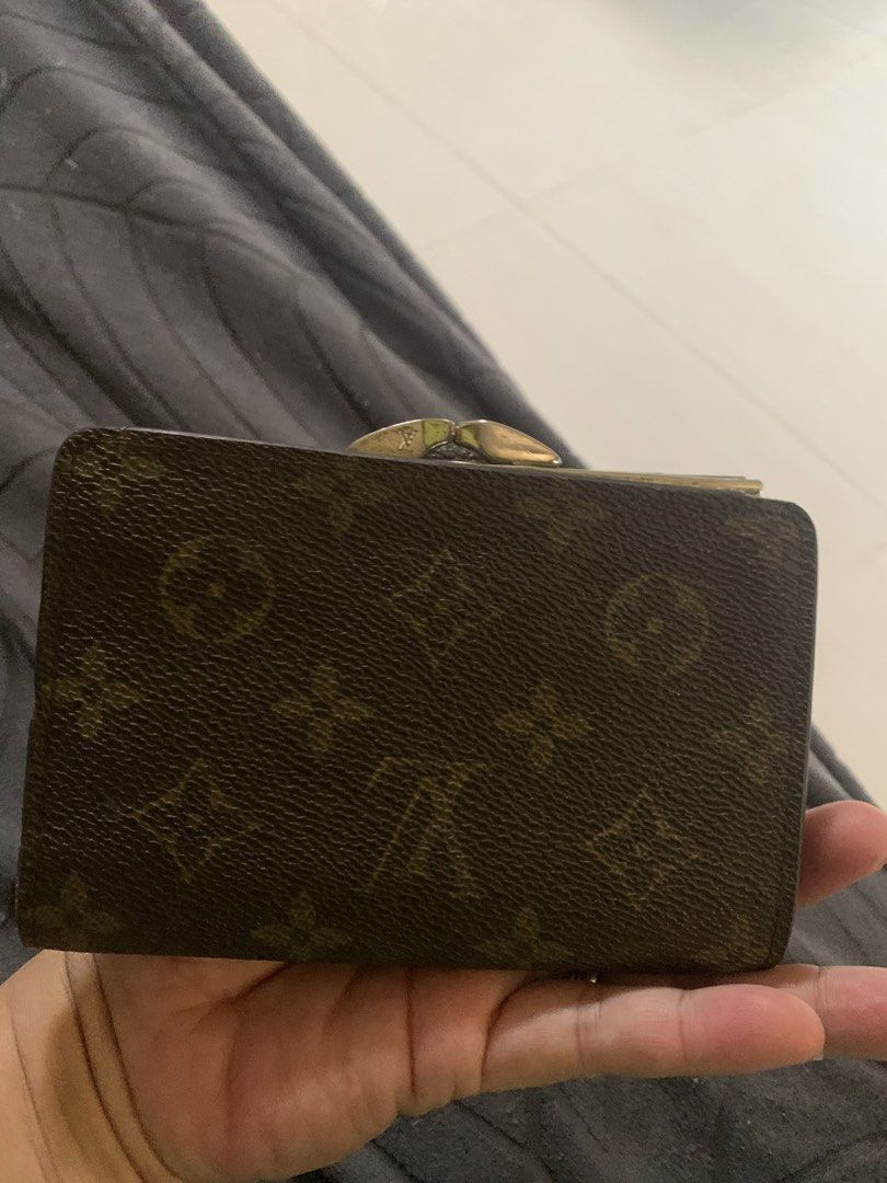 Louis Vuitton Monogram Canvas Bifold Wallet (Category: Luxury Bags & Wallets) located in Liloan. Submitted by jinalyns (Listing ID 1458961111, Image 2). Description: Louis Vuitton wallet - Classic monogram canvas - Bifold style with snap closure - Interior: card slots, bill compartment - Ideal for everyday use.