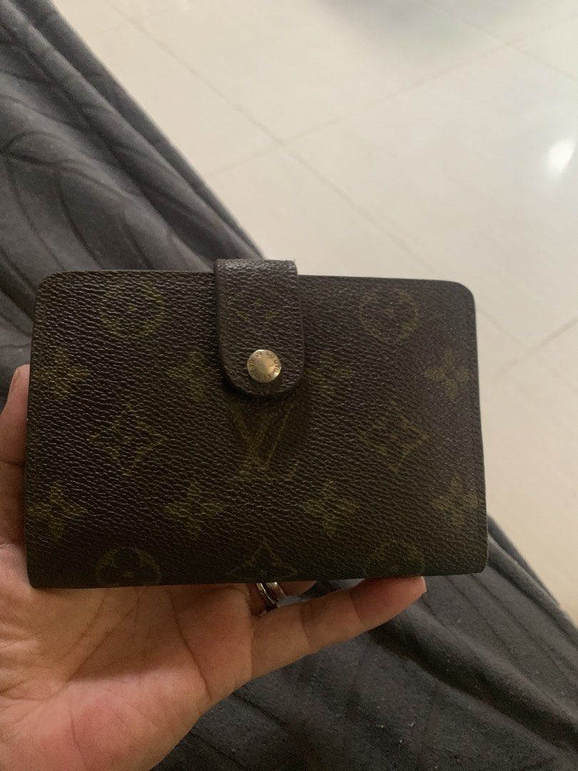 Louis Vuitton Monogram Canvas Bifold Wallet (Category: Luxury Bags & Wallets) located in Liloan. Submitted by jinalyns (Listing ID 1458961111, Image 1). Description: Louis Vuitton wallet - Classic monogram canvas - Bifold style with snap closure - Interior: card slots, bill compartment - Ideal for everyday use.