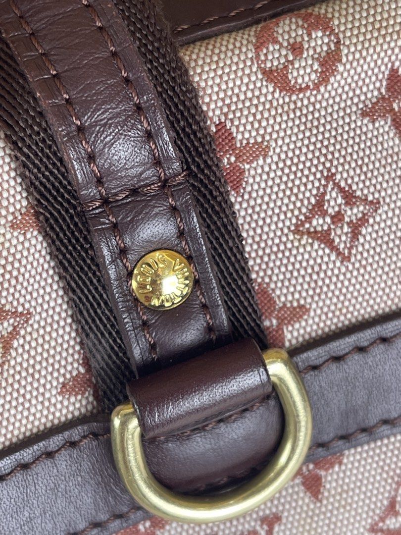 Louis Vuitton Monogram Canvas Handbag (Category: Luxury Bags & Wallets) located in Manila. Submitted by cuaresmahajji (Listing ID 1459059806, Image 3). Description: - Authentic Louis Vuitton Monogram Canvas Handbag - Classic brown leather trim and handles - Secure zipper closure with two small padlocks - Interior zippered pocket - Interior shows some light stains - Ideal for everyday use.